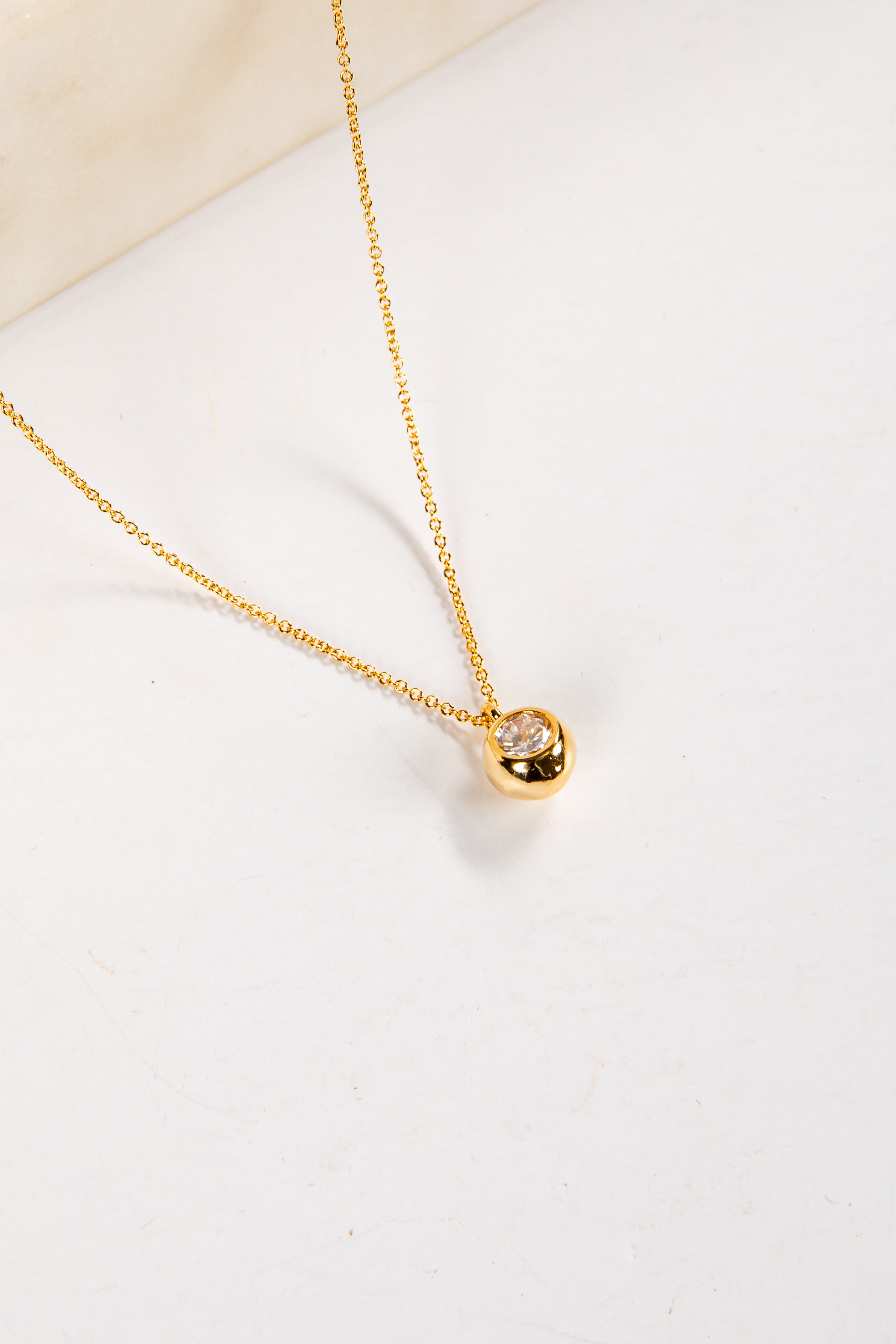 Daphne Gold Rhinestone Ball Charm Necklace